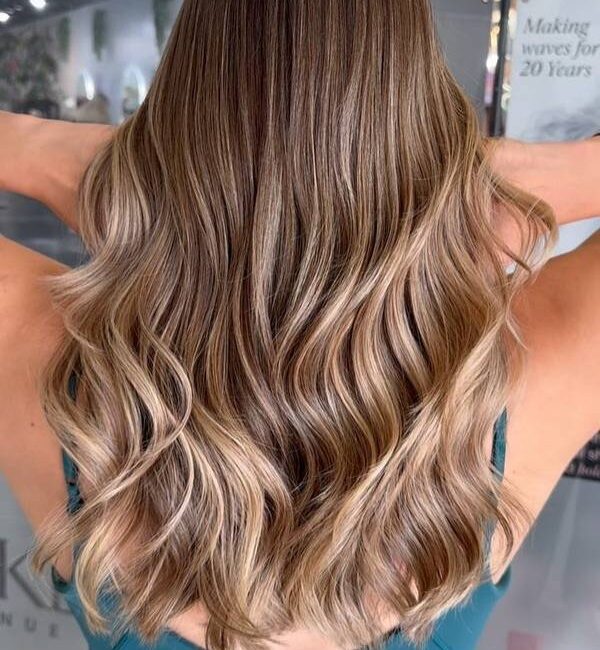 Face-framing balayage blend by MaVo Hair Lounge in Fort Lauderdale
